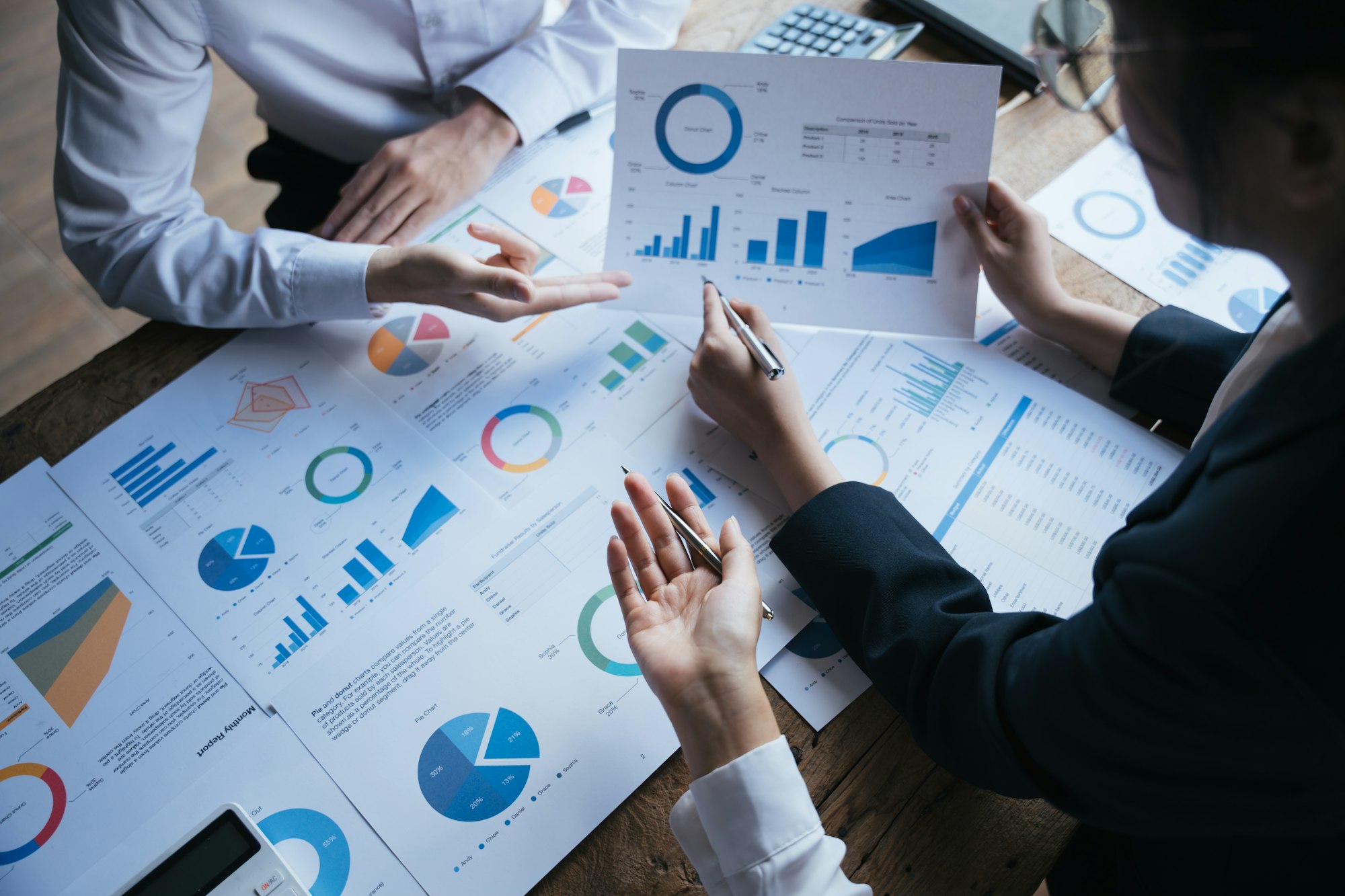 business people group meeting and using check chart in office